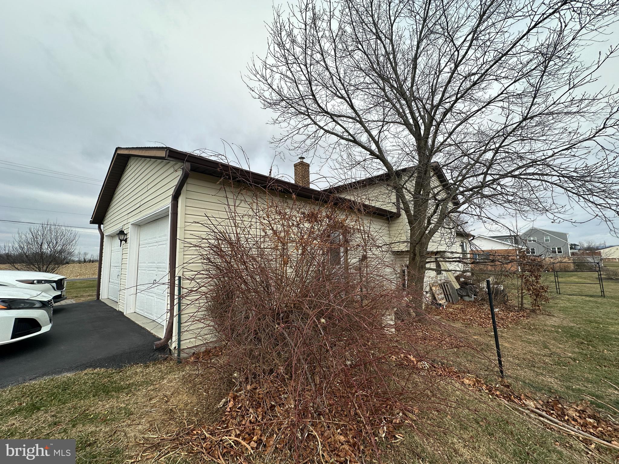 12103 Itnyre Road Smithsburg, MD 21783 - Photo 8 of 84 a view of a car park in front of a house