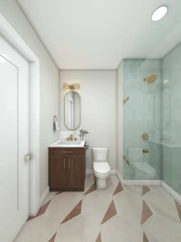 a spacious bathroom with a sink a toilet and shower