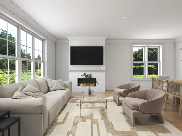 a living room with fireplace furniture and a flat screen tv