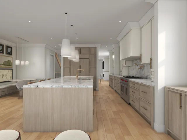 a large kitchen with kitchen island a island a stove a sink a refrigerator and white cabinets