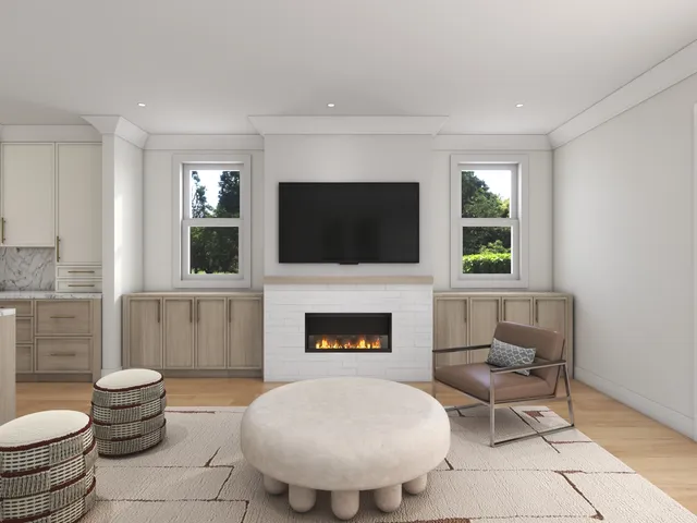 a living room with furniture a flat screen tv and a fireplace