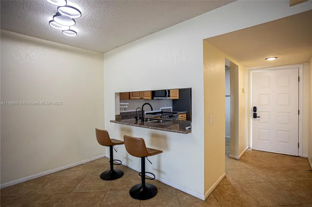 a view of a livingroom and a chair