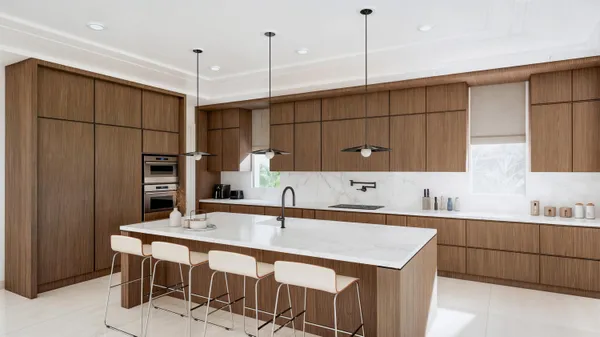a kitchen with stainless steel appliances granite countertop a sink a microwave and a refrigerator