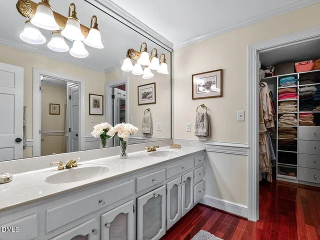 a living room with stainless steel appliances furniture or couch and a view of kitchen