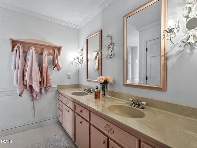 a view of a porch with furniture and wooden floor