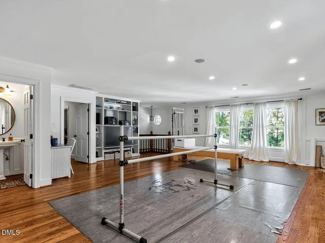 a front view of a residential apartment building with a yard