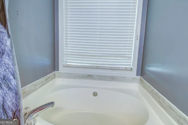 a bathroom with a bathtub