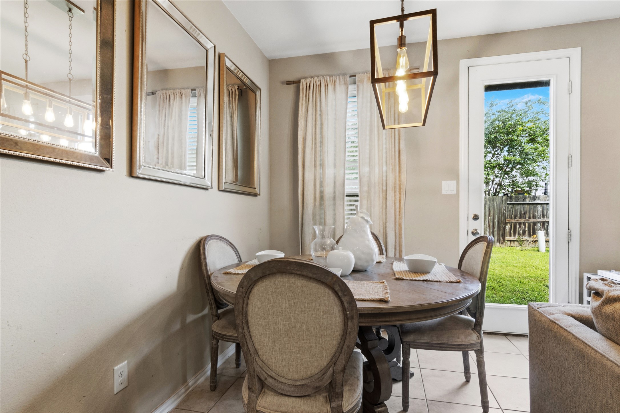1815 Ryon Falls Drive Richmond, TX 77469 - Photo 12 of 24 a view of a dining room with furniture and a window