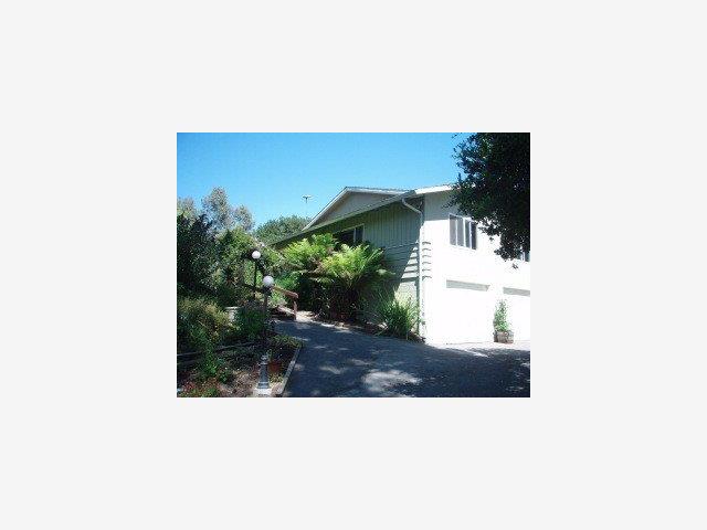 60 Webb Road Watsonville, CA 95076 - Photo 1 of 9 a picture of a person on a street
