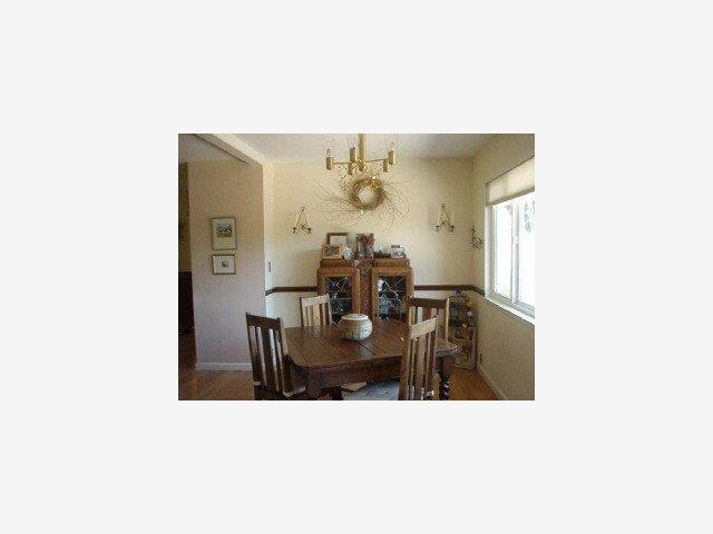 60 Webb Road Watsonville, CA 95076 - Photo 4 of 9 a kitchen with a table and chairs in it