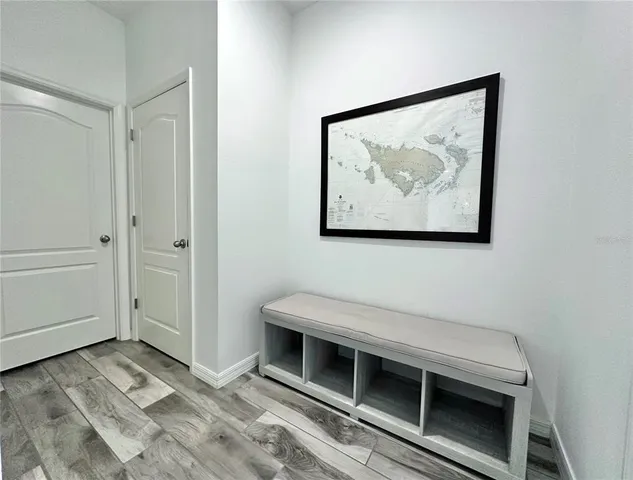 a bathroom with a sink toilet and a mirror