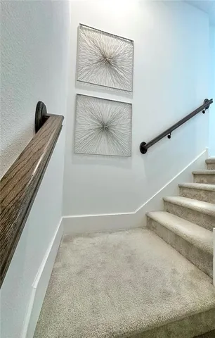 a bedroom with bed and a flat screen tv