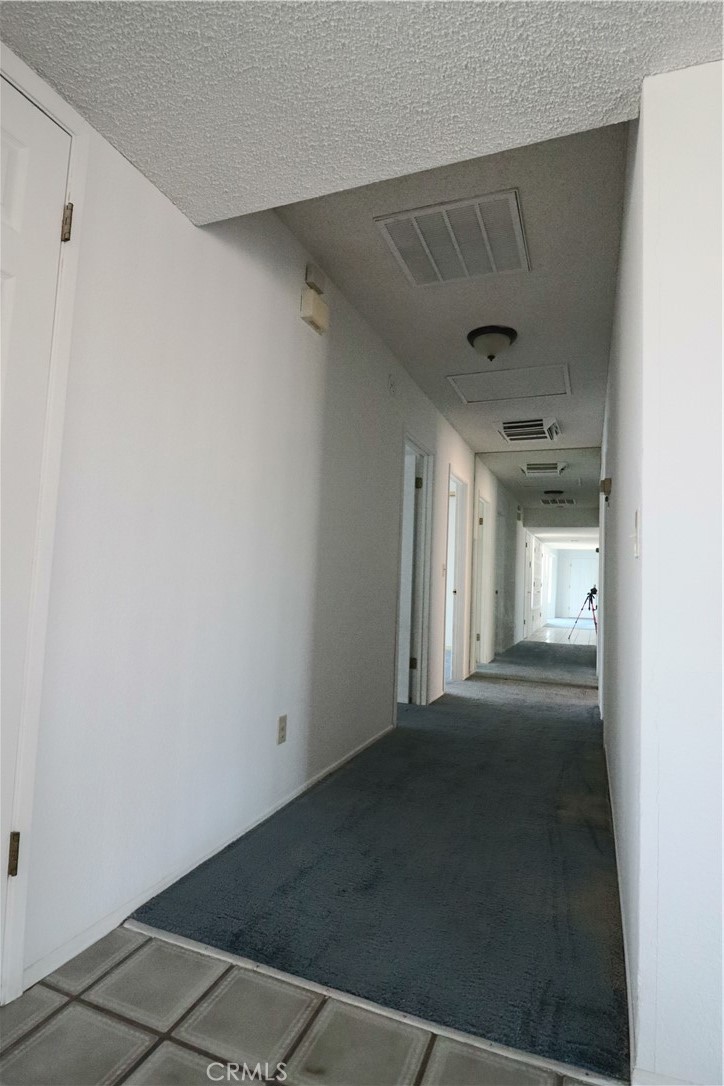 4752 Flying H Road Twentynine Palms, CA 92277 - Photo 33 of 55 a view of a hallway