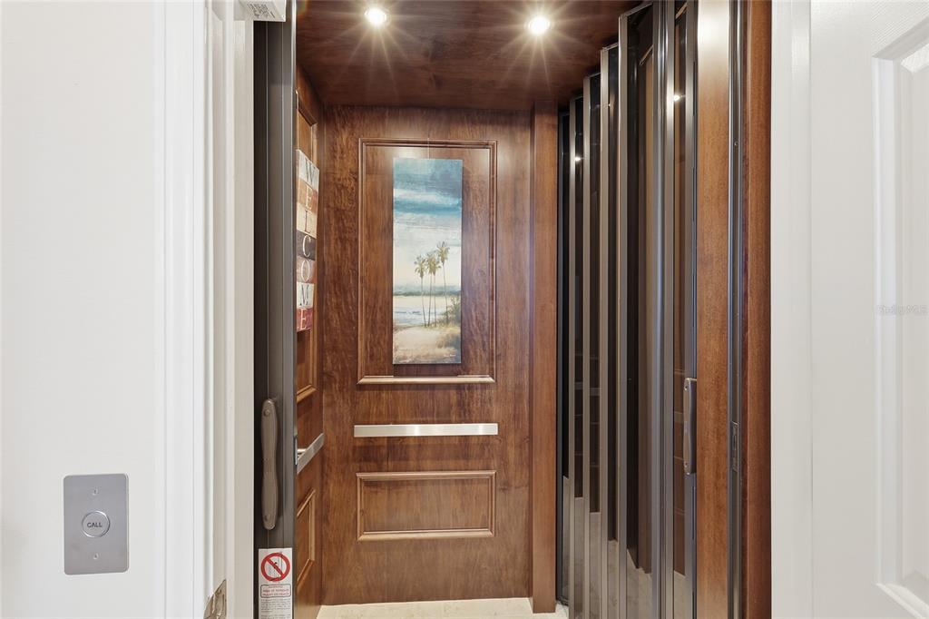 8063 St Simons Street, Unit 8063 University Park, FL 34201 - Photo 2 of 29 a view of elevator with hallway