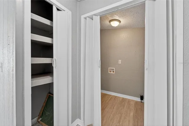 a view of an empty walk in closet