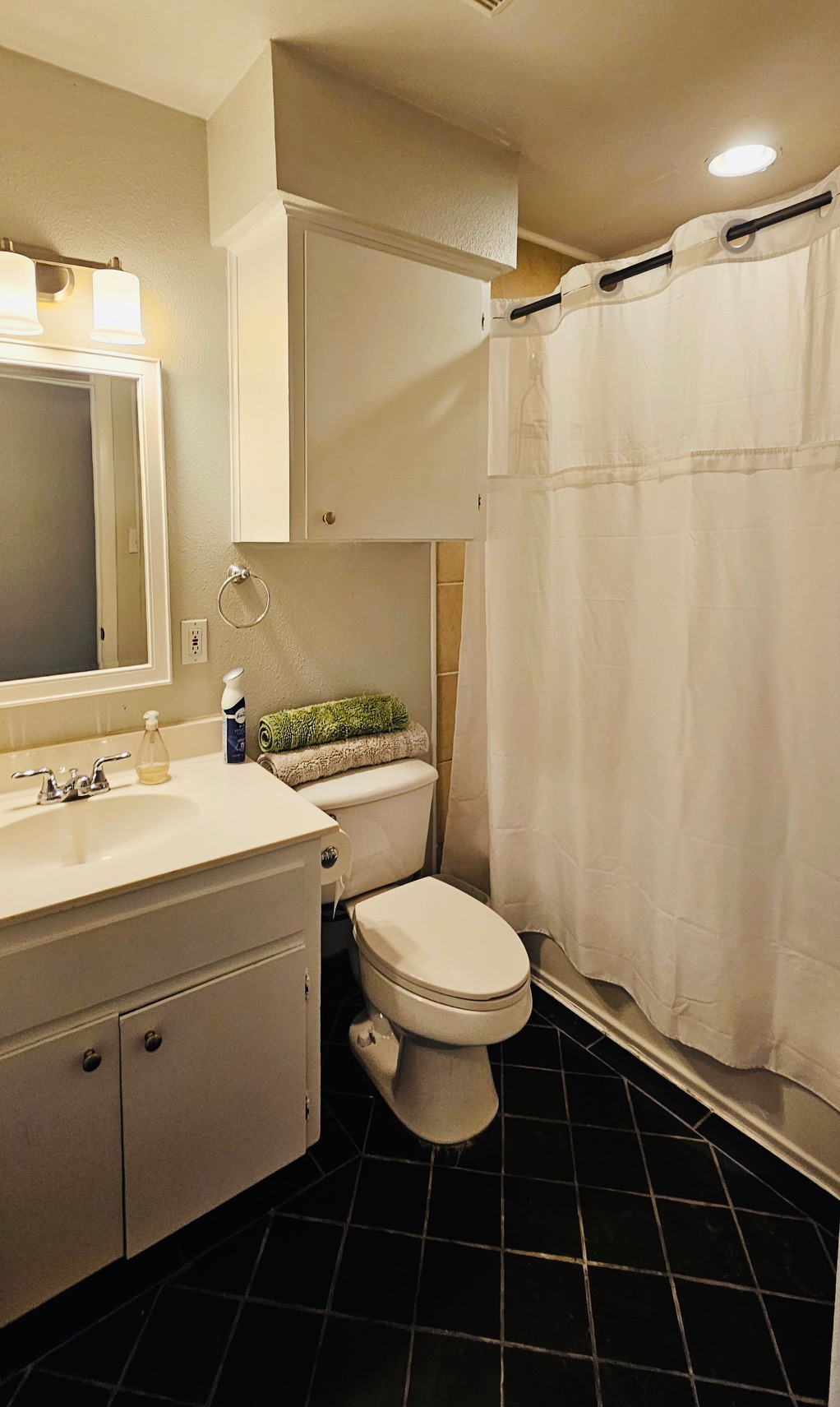 5107 Leralynn Street, Unit 304 Austin, TX 78751 - Photo 18 of 28 Full bath featuring vanity, toilet, and tile patterned flooring