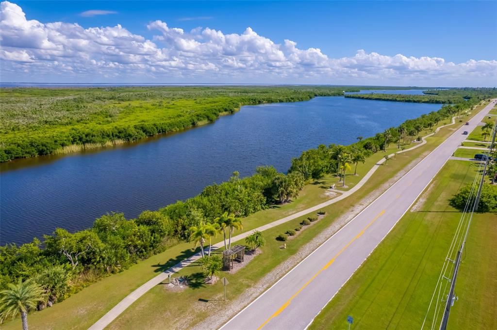 14265 Imlay Avenue Port Charlotte, FL 33981 - Photo 13 of 22 a view of a back yard of a house