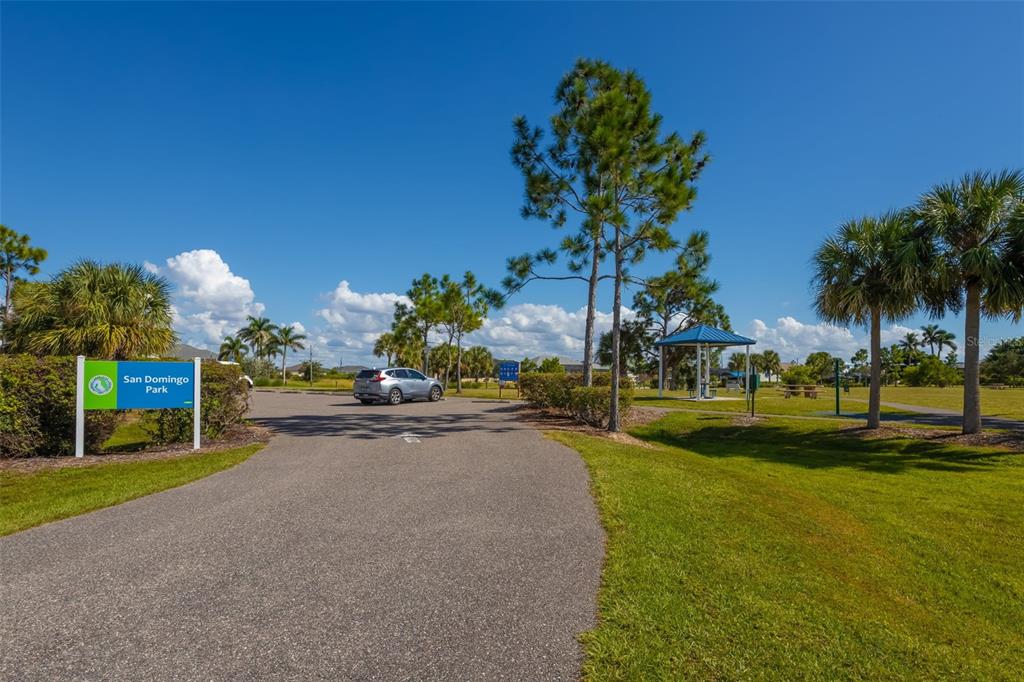 14265 Imlay Avenue Port Charlotte, FL 33981 - Photo 14 of 22 a swimming pool with outdoor seating and yard
