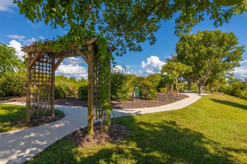14265 Imlay Avenue Port Charlotte, FL 33981 - Photo 16 of 22 a view of a yard with swimming pool