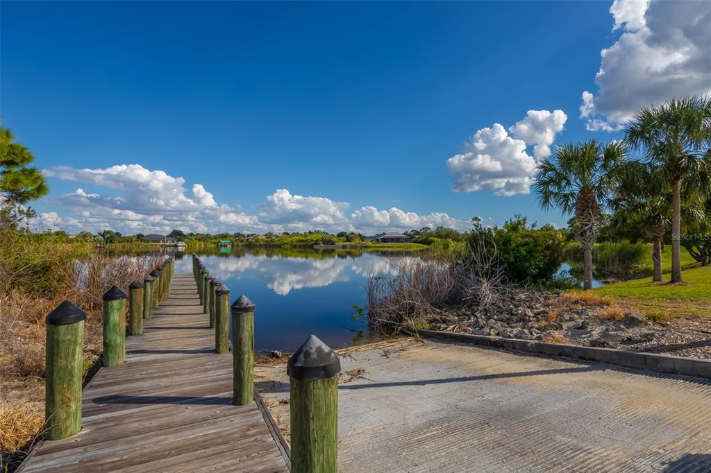 14265 Imlay Avenue Port Charlotte, FL 33981 - Photo 18 of 22 a view of a lake with a mountain view