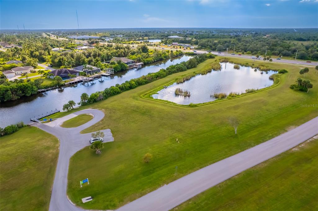 14265 Imlay Avenue Port Charlotte, FL 33981 - Photo 22 of 22 a view of a swimming pool and an ocean