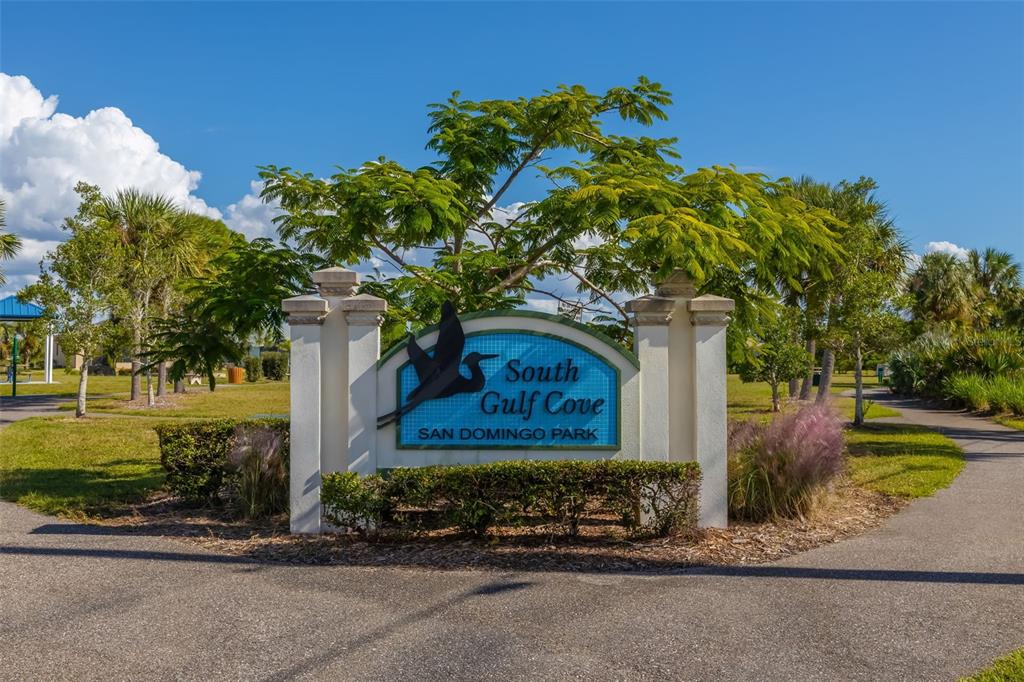 14265 Imlay Avenue Port Charlotte, FL 33981 - Photo 10 of 22 a front view of a house with a yard