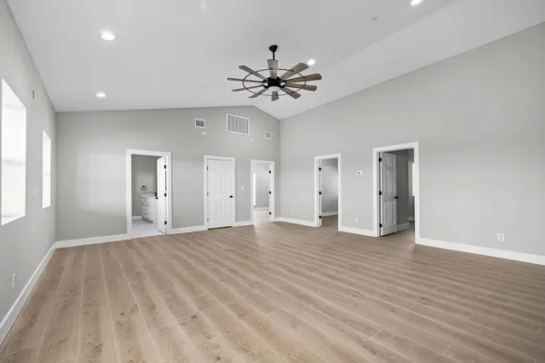 a view of an empty room with a window