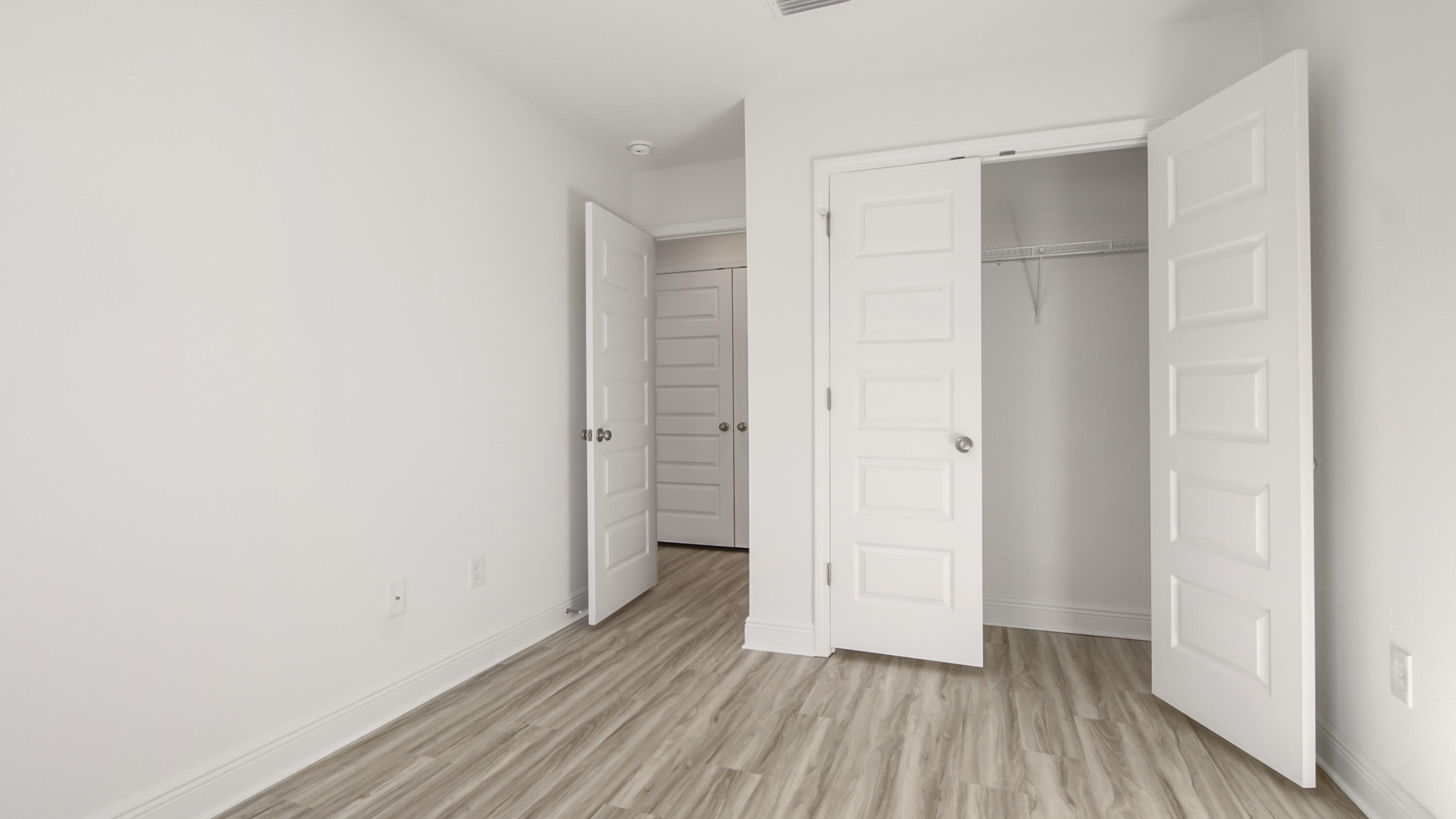 73 Mamba Lane Santa Rosa Beach, FL 32459 - Photo 24 of 35 a view of a room with wooden floor