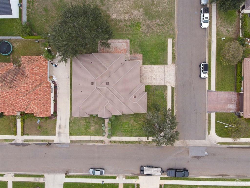 2405 West Rhin Drive Edinburg, TX 78539 - Photo 23 of 26 an aerial view of a house with a yard and large tree