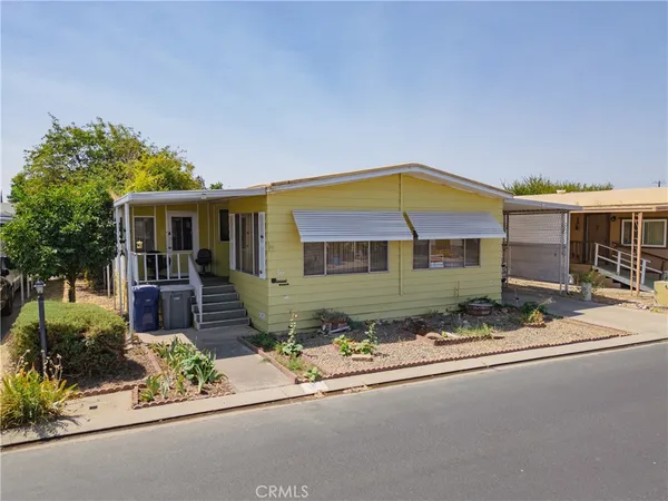 front view of a house with a street