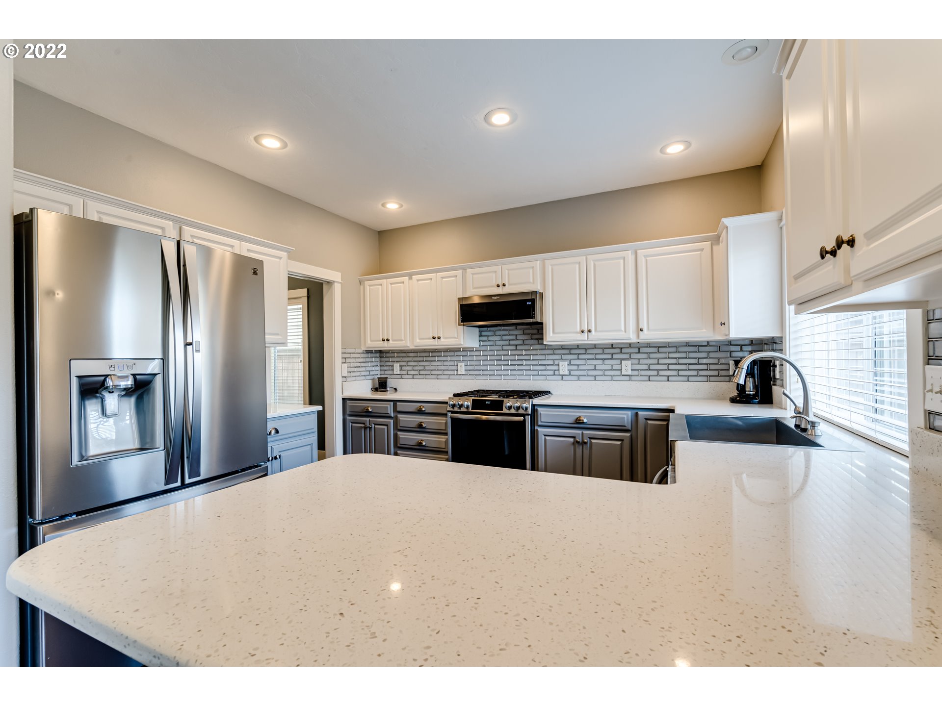 3370 Falcon Drive Springfield, OR 97477 - Photo 12 of 29 a kitchen with stainless steel appliances granite countertop a refrigerator a stove top oven a sink and dishwasher