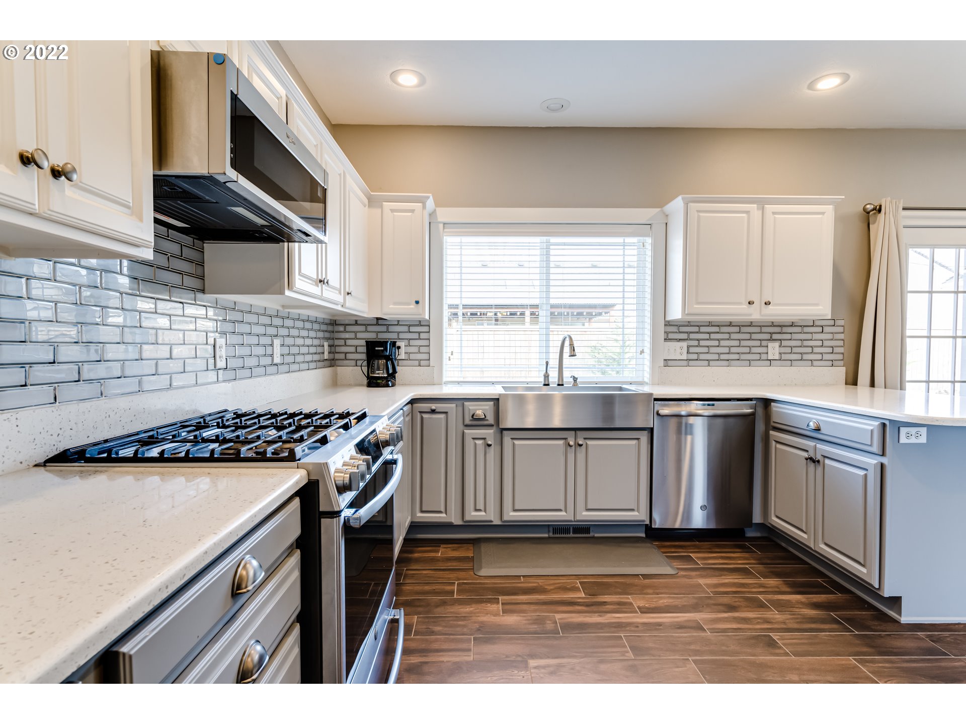 3370 Falcon Drive Springfield, OR 97477 - Photo 13 of 29 a kitchen with a sink stove top oven and cabinets