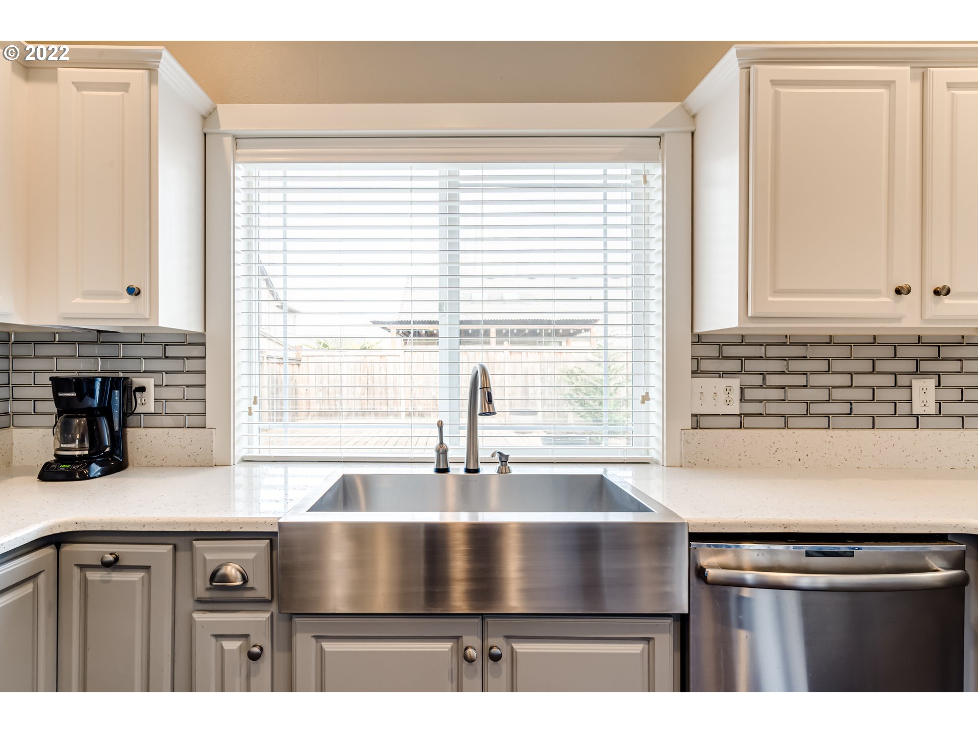 3370 Falcon Drive Springfield, OR 97477 - Photo 14 of 29 a kitchen with kitchen island a sink stove and cabinets
