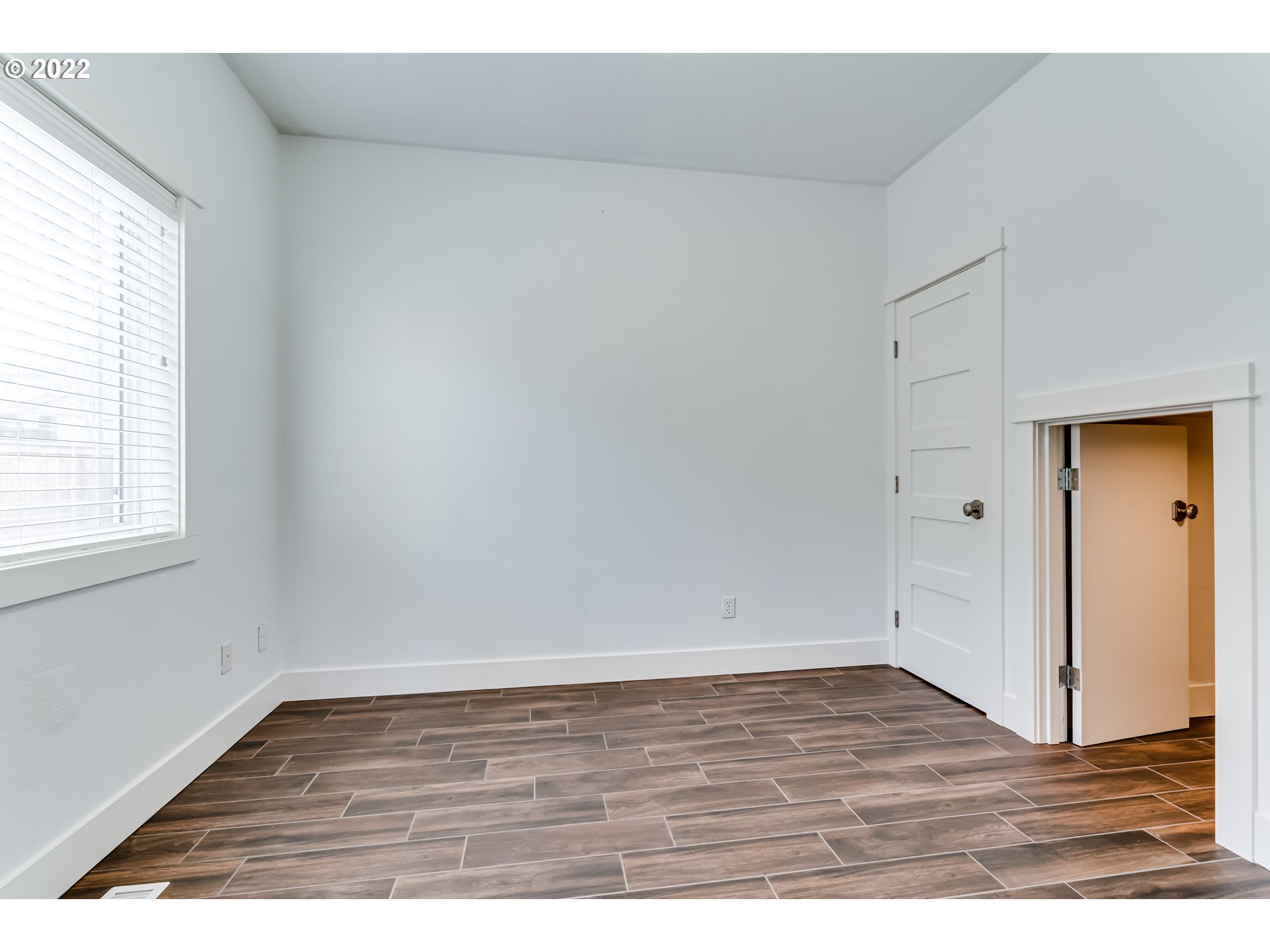 3370 Falcon Drive Springfield, OR 97477 - Photo 16 of 29 an empty room with wooden floor