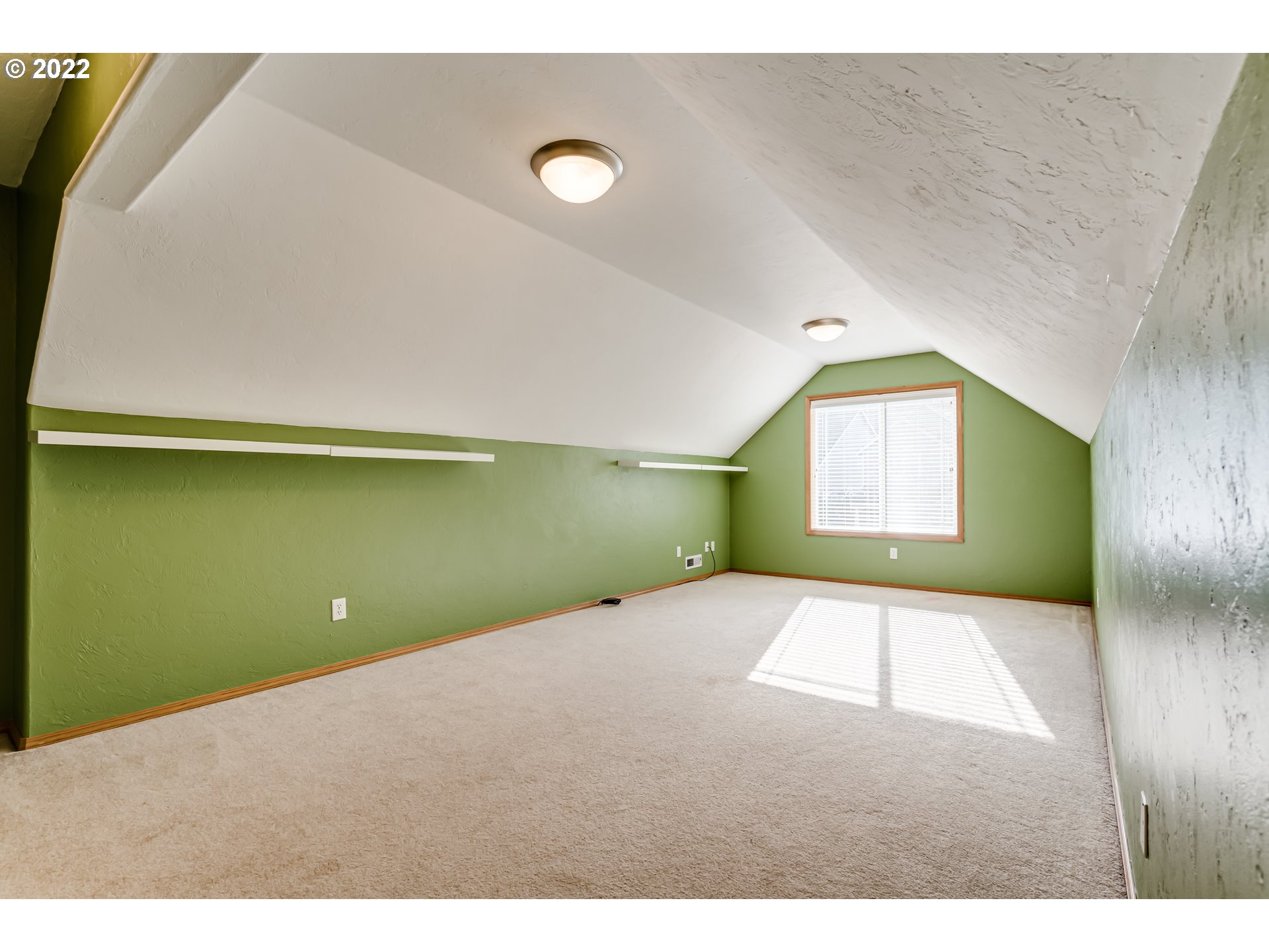 3370 Falcon Drive Springfield, OR 97477 - Photo 24 of 29 a view of an empty room with window and wooden floor