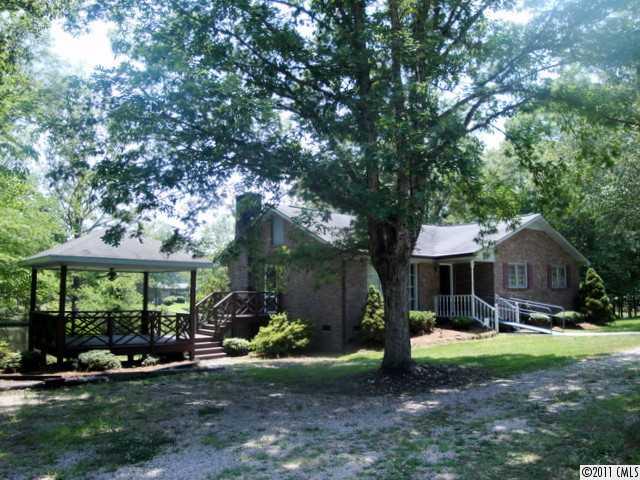 1147 Donnybrook Road Catawba, SC 29704 - Photo 2 of 16 a view of a house with backyard and sitting area