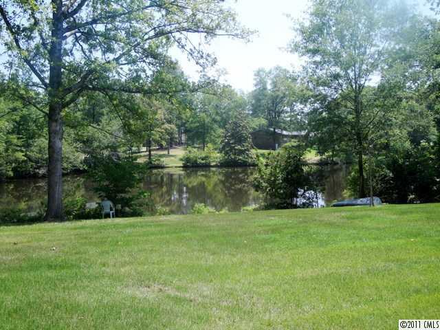 1147 Donnybrook Road Catawba, SC 29704 - Photo 11 of 16 a backyard of a house with lots of green space