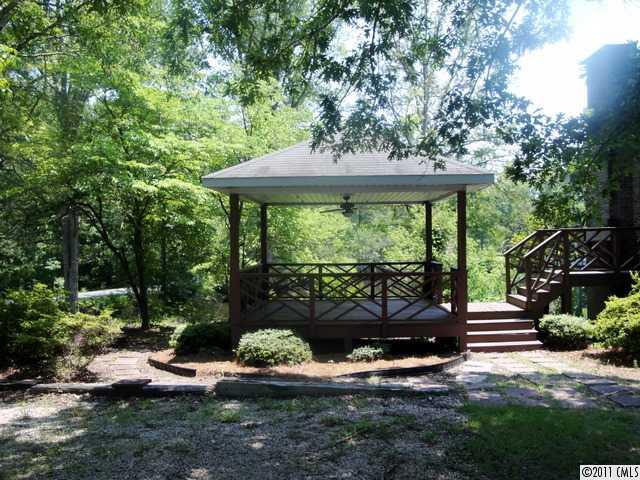 1147 Donnybrook Road Catawba, SC 29704 - Photo 12 of 16 a view of a garden with plants and large trees