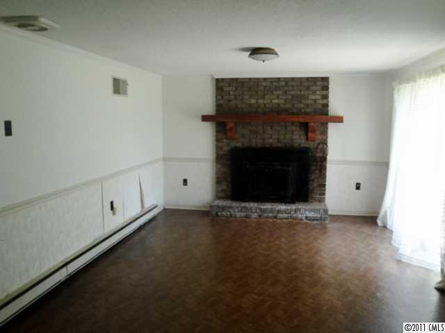 1147 Donnybrook Road Catawba, SC 29704 - Photo 9 of 16 a view of empty room with fireplace