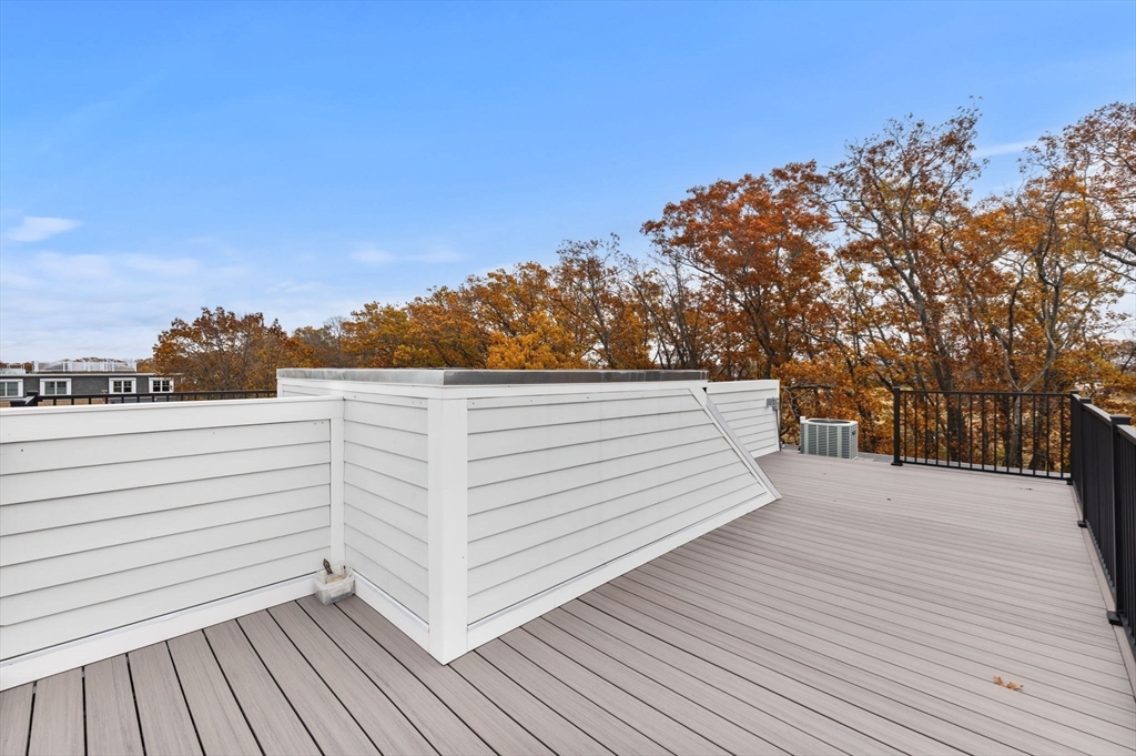 599 Sea Street, Unit 1 Quincy, MA 02169 - Photo 32 of 37 a view of a terrace with sky view
