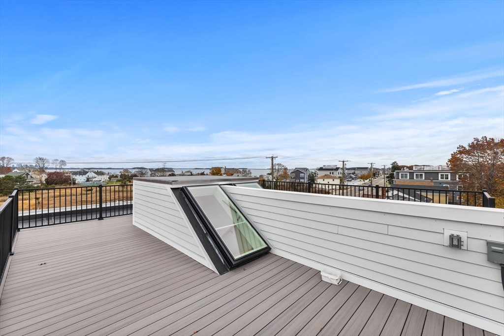 599 Sea Street, Unit 1 Quincy, MA 02169 - Photo 34 of 37 a view of a terrace with sky view