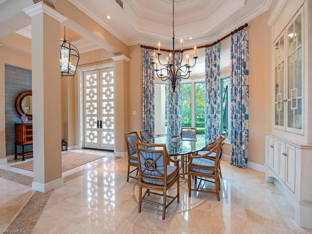 3123 Dahlia Way Naples, FL 34105 - Photo 16 of 29 a view of a dining room with furniture window and outside view