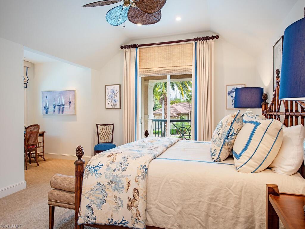 3123 Dahlia Way Naples, FL 34105 - Photo 22 of 29 a bed room with a bed and a chair