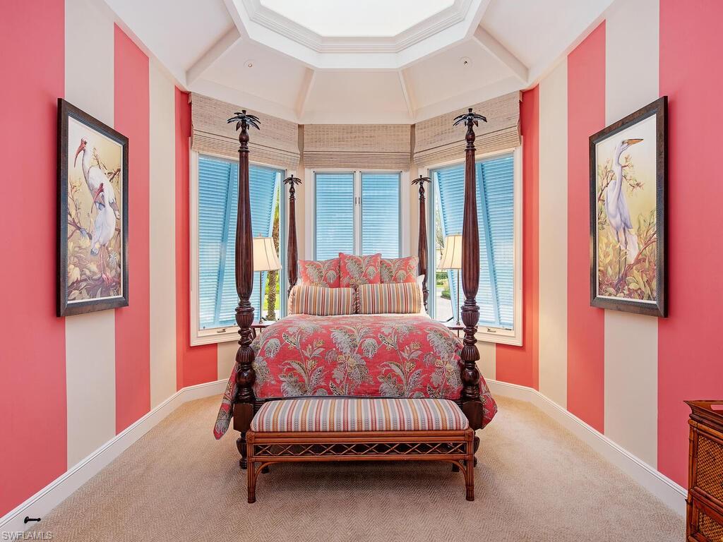 3123 Dahlia Way Naples, FL 34105 - Photo 26 of 29 a bedroom with a bed and a window