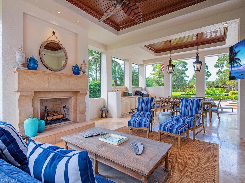3123 Dahlia Way Naples, FL 34105 - Photo 9 of 29 a view of a dining room with furniture window and outside view