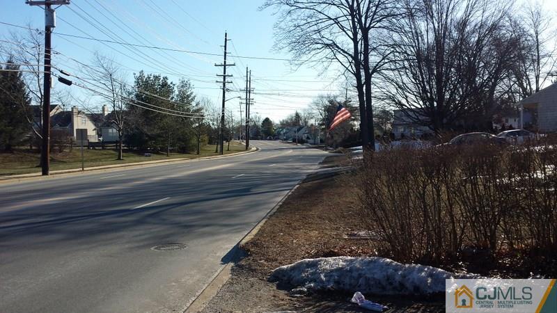 143 Milltown Road East Brunswick, NJ 08816 - Photo 4 of 6 a view of a street with a cars parked on the road