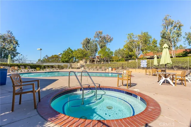 a view of a chairs and table in the patio