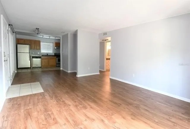 a view of a kitchen with a sink