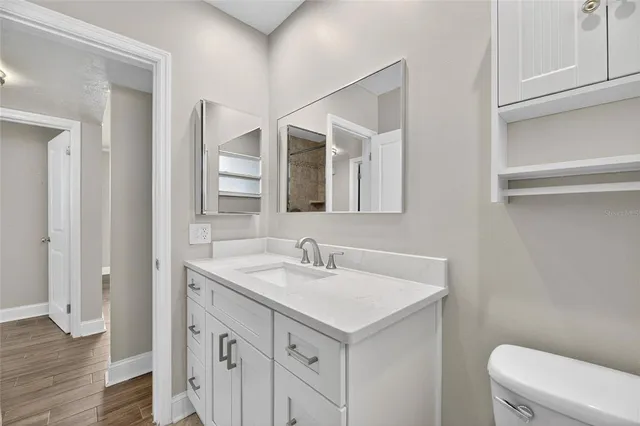 a bathroom with a sink and a toilet