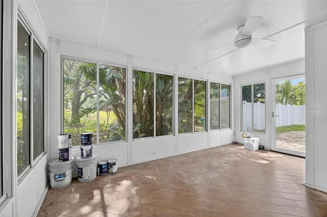 a view of livingroom with furniture and floor to ceiling window